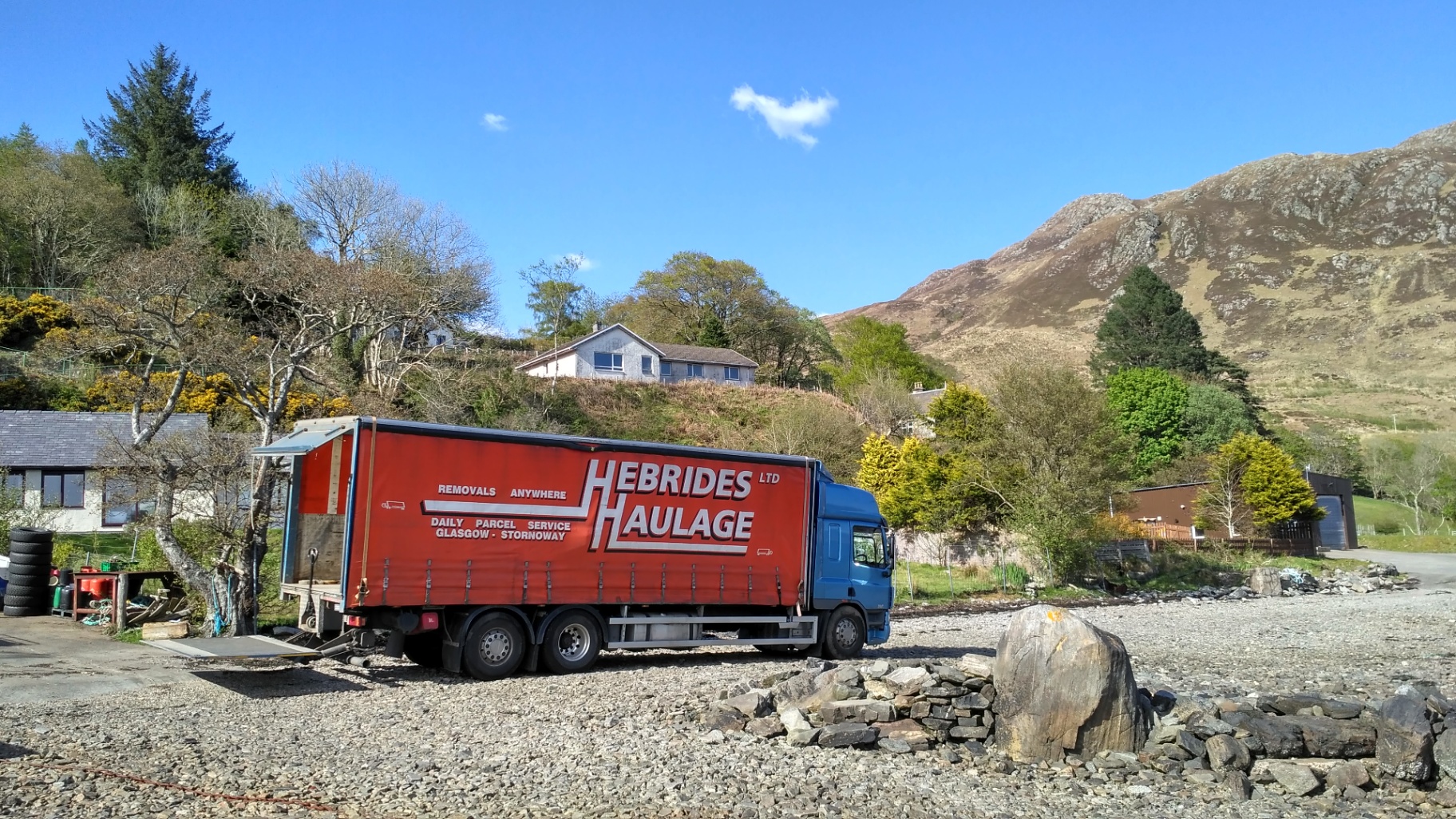 Hebrides Haulage curtain-sider parked in the Scottish Highlands